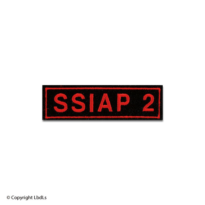 Ecusson rectangle SSIAP 2 10 x3 cm fond noir lettres rouges   à 2,00 €